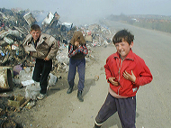 children_playing_in_garbage